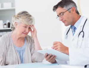 Doctor-Explaining-Elderly-Patient's-Taste-Disorder