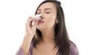 Woman Experiencing Nosebleeds Caused by Turbinate Hypertrophy