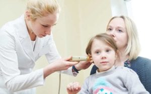 doctor-evaluating-child-after-ear-enlargement-LA-ENT-Doctor